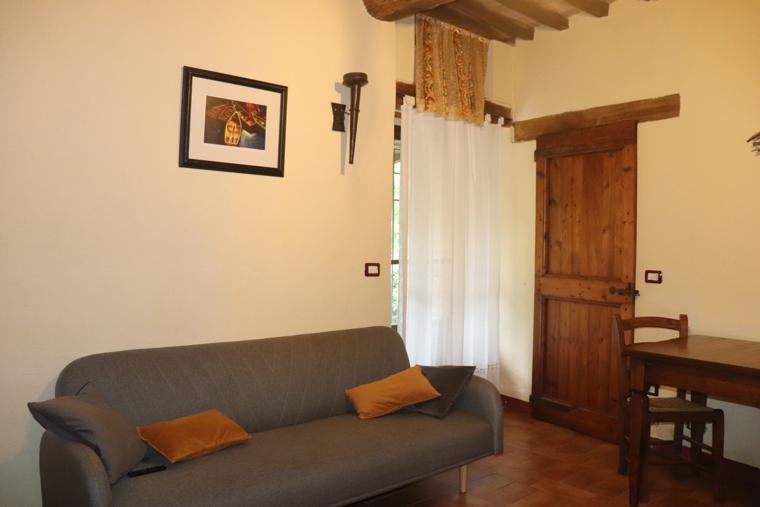 The Garden Apartment sitting room with sofa
